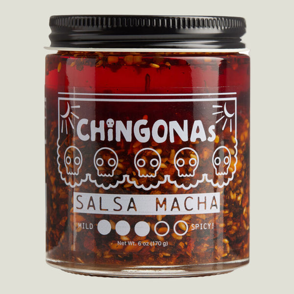 Jar of Chingonas Salsa Macha with tortoiseshell pattern and black lid.