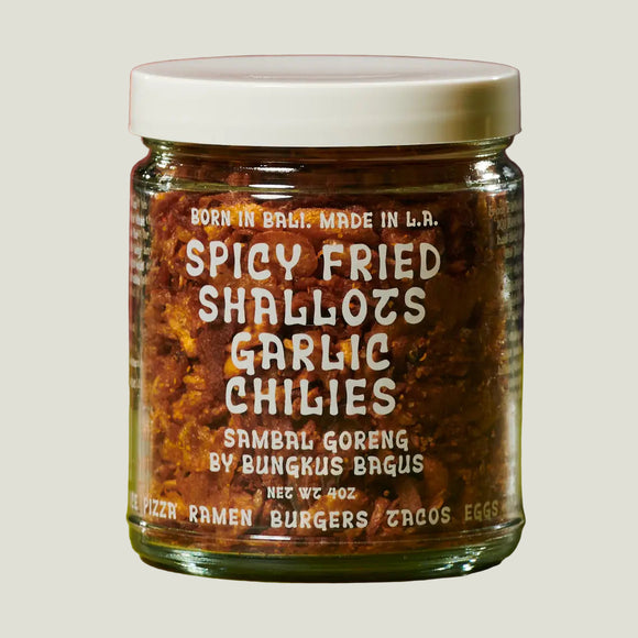 Jar of spicy fried shallots with text on a gradient background
