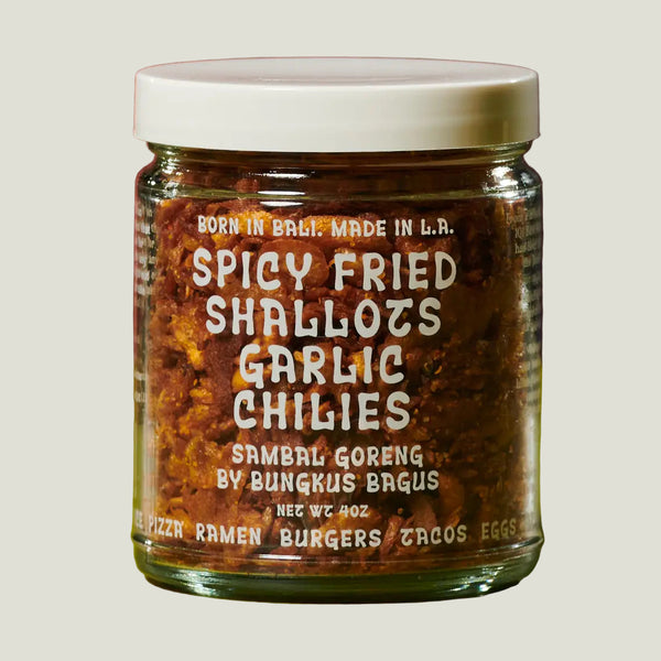 Jar of spicy fried shallots with text on a gradient background