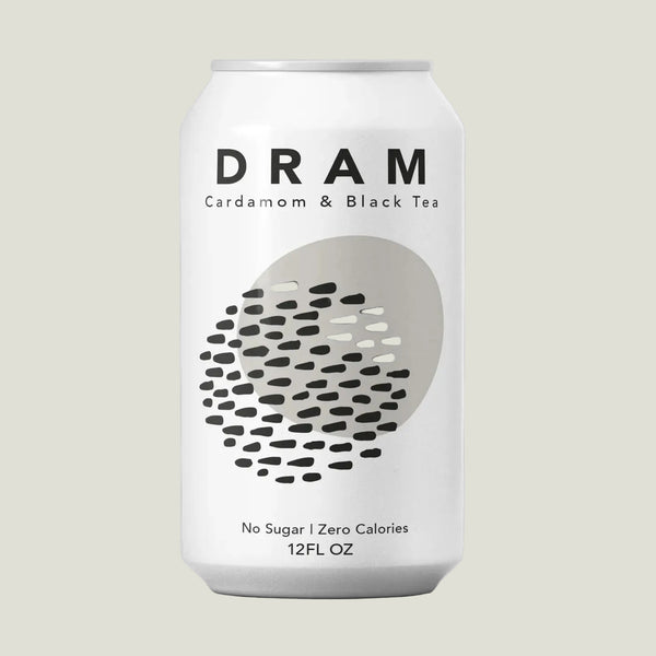 DRAM cardamom & black tea can on a light gray background