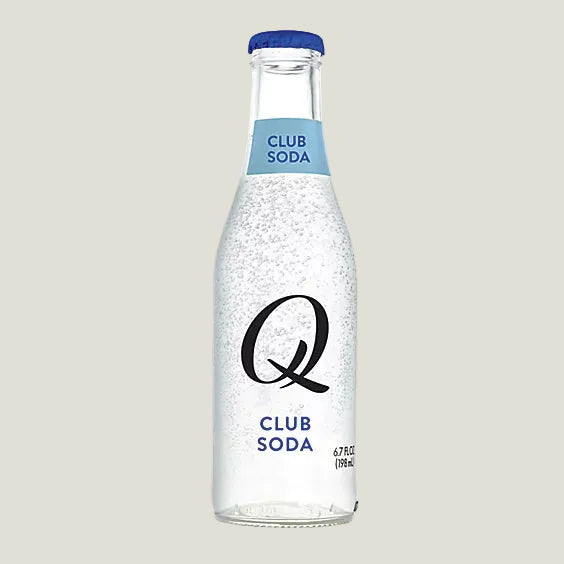 Clear bottle of Club Soda with blue label on a white background
