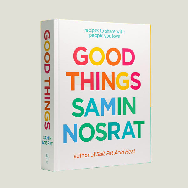 Book titled 'Good Things' by Samin Nosrat on a yellow and green background
