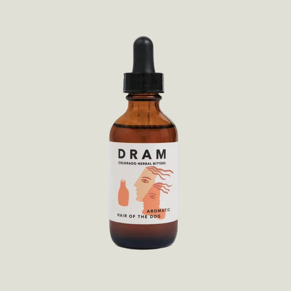Bottle of 'Dram' Colorado Herbal Bitters on a gray background