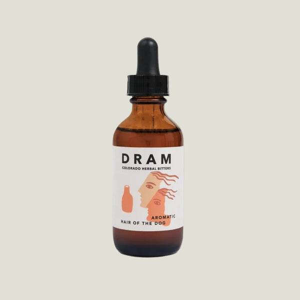 Bottle of 'Dram' Colorado Herbal Bitters on a gray background