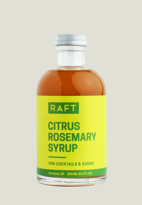 Bottle of RAFT Citrus Rosemary Syrup with a yellow label on a white background