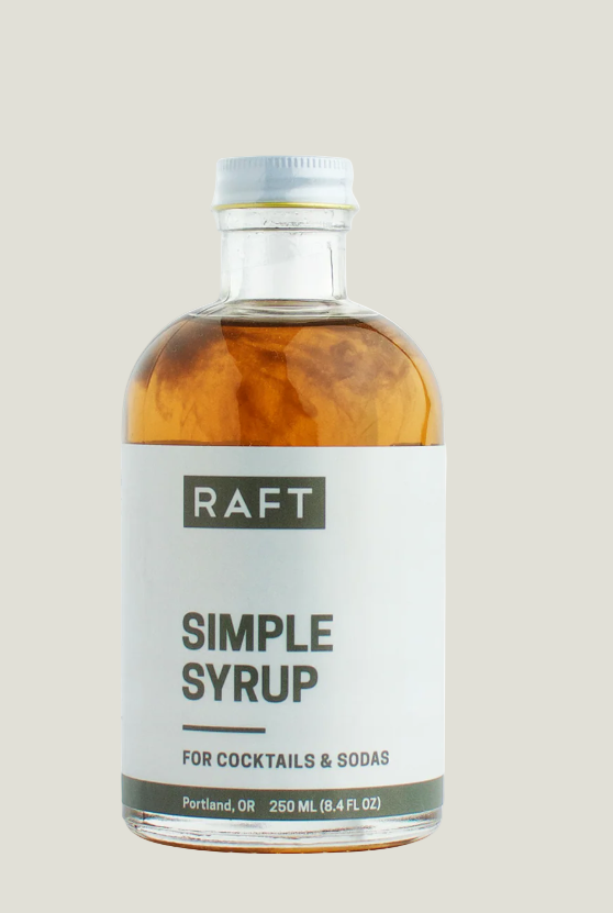 Bottle of RAFT simple syrup on a white background
