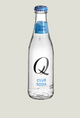 Clear glass bottle of Q Club Soda with a blue label on a white background