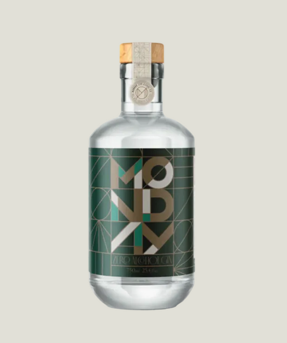 Clear glass bottle with a green label on a white background