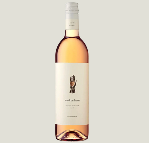 Wine bottle with a label featuring a hand design on a white background