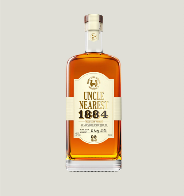 Bottle of Uncle Nearest 1884 whiskey on a light gray background