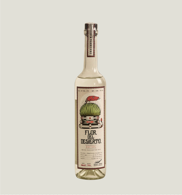 Bottle of 'Flor del Desierto' tequila on a light gray background