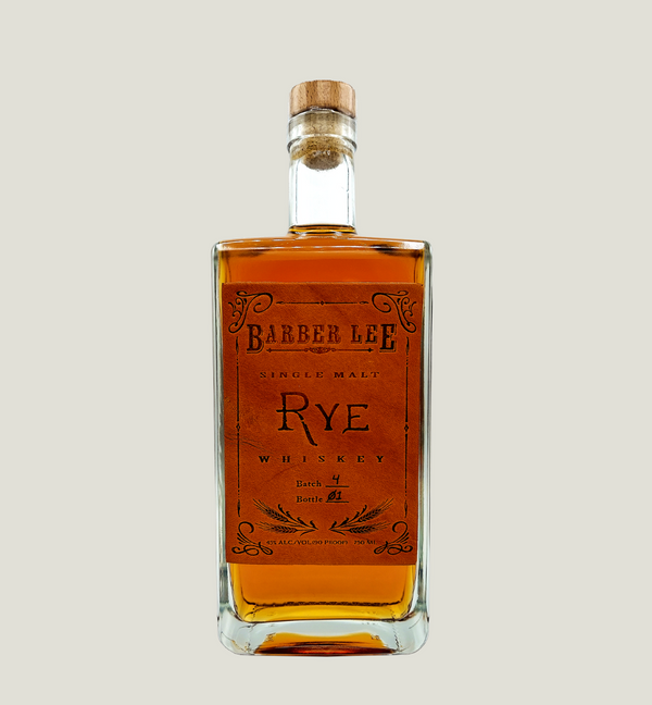 Bottle of Barber Lee Rye Whiskey on a light gray background