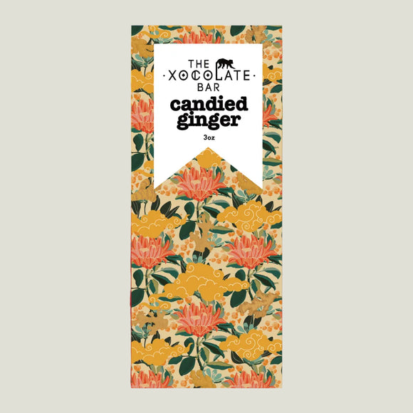 Chocolate bar packaging with floral design on a yellow and red background