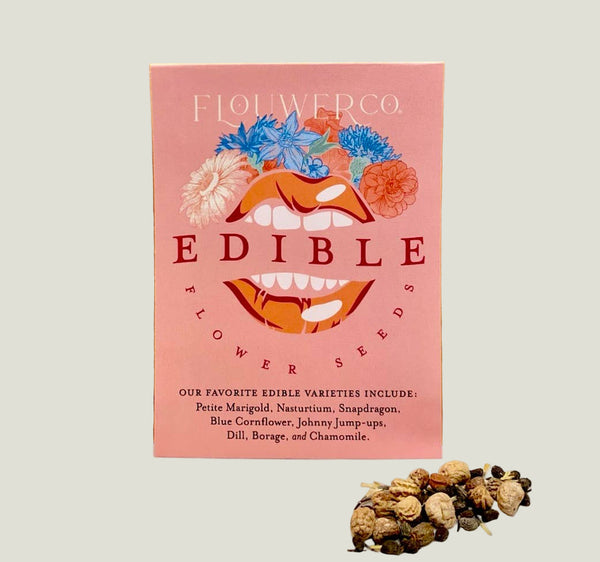 Edible flower seeds packet with floral design and text on a pink background