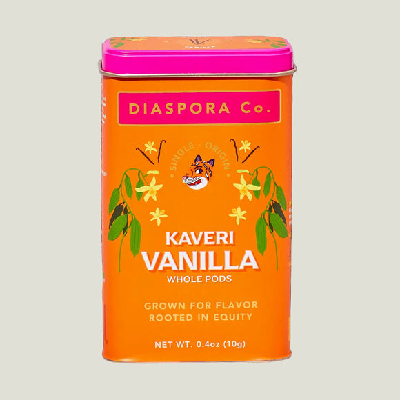 Diaspora Co. Kaveri Vanilla packaging on a background of vanilla beans