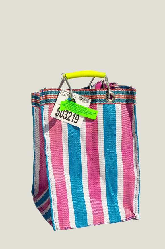 Striped bag with a green tag on a white background