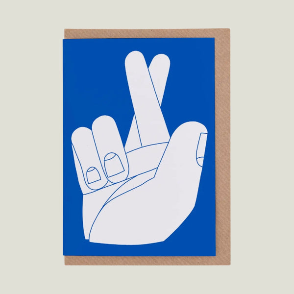 Greeting card with an illustrated hand making a finger's crossed sign on a blue background