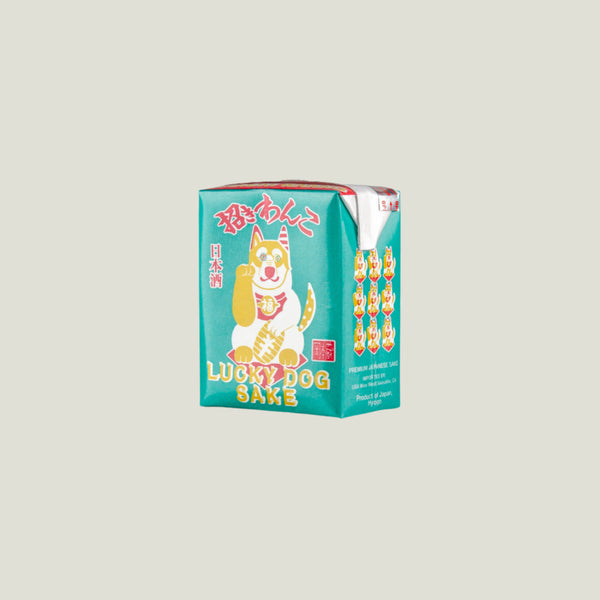 Box of Lucky Dog Sake with a cartoon dog design on a white background