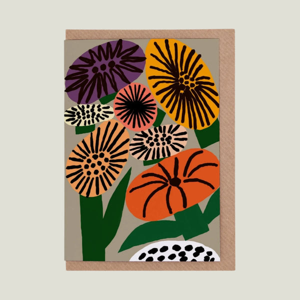 Greeting card with colorful floral design on a beige background
