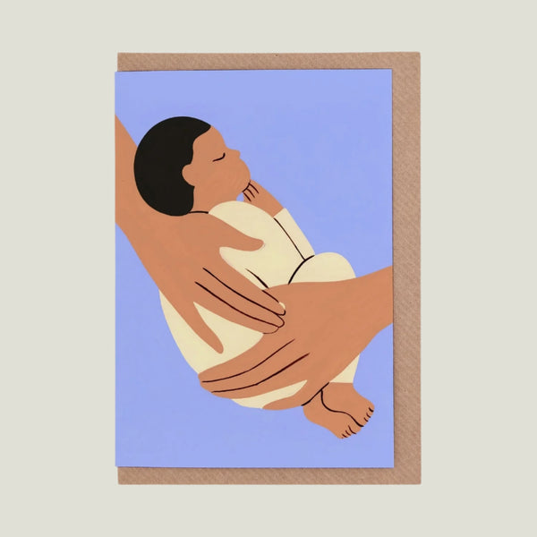 Illustration of a hand holding a sleeping baby against a blue background