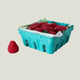 Turquoise berry basket with realistic strawberry candles on an off-white background.