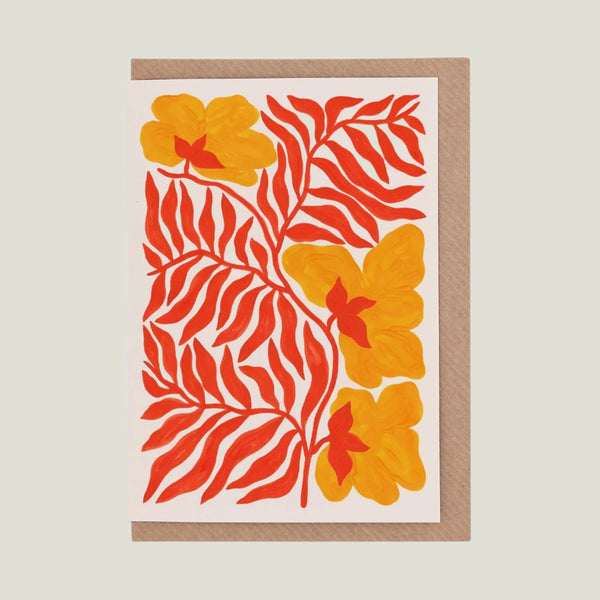 Floral patterned card with red and orange flowers on a white background