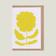 Greeting card with a yellow flower design on a white background